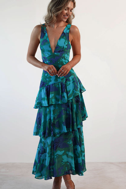 Teal and navy abstract print ruffle midi dress with tiered layers and deep V-neckline