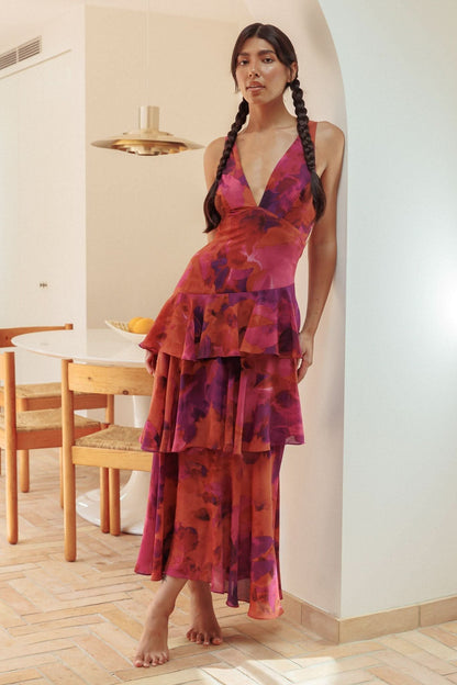 Red and purple tie-dye ruffle midi dress with deep V-neck and tiered ruffled layers