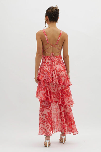 Back view of coral floral dress showing lace-up strappy back design
