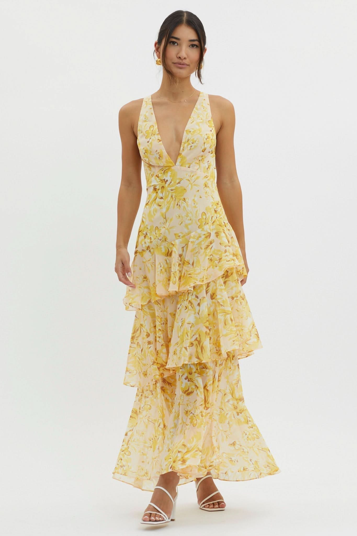 Yellow floral ruffle midi dress with tiered skirt and deep V-neckline