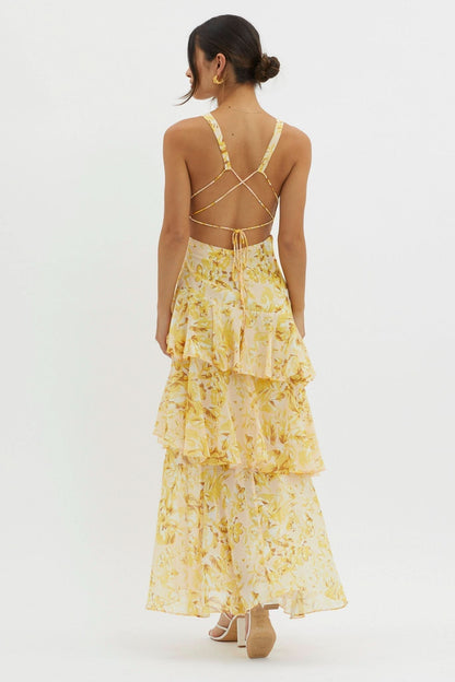 Back view of yellow floral dress with lace-up strappy back cutout
