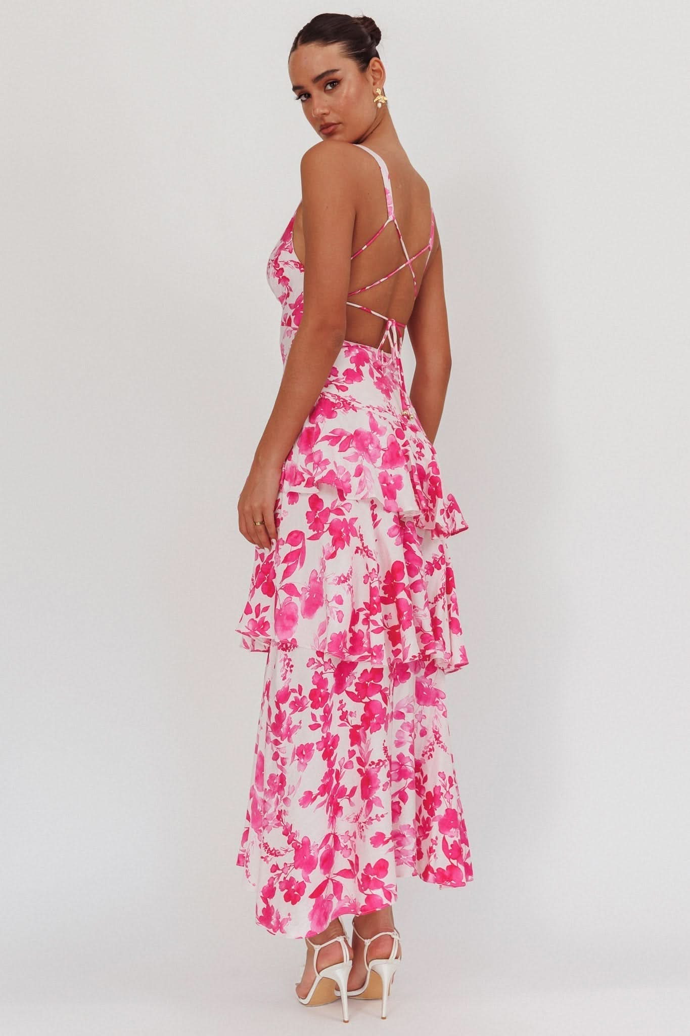 Back view of pink floral midi dress with strappy lace-up back