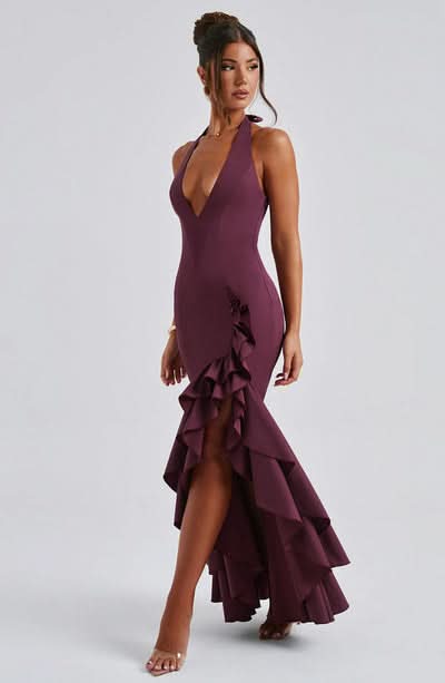 Deep burgundy halter evening gown with cascading ruffled asymmetrical hem
