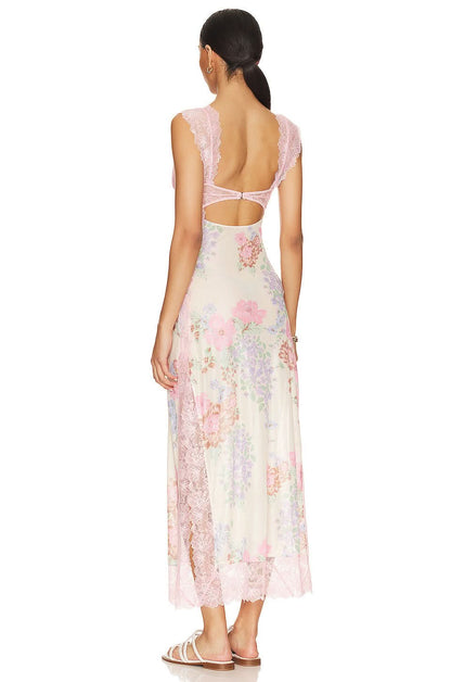 Back view of pink lace slip dress with open back cutout detail