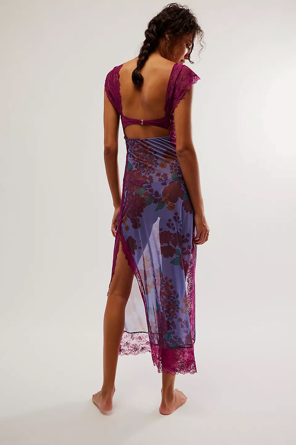 Back view of burgundy maxi slip dress showing open back and lace hem