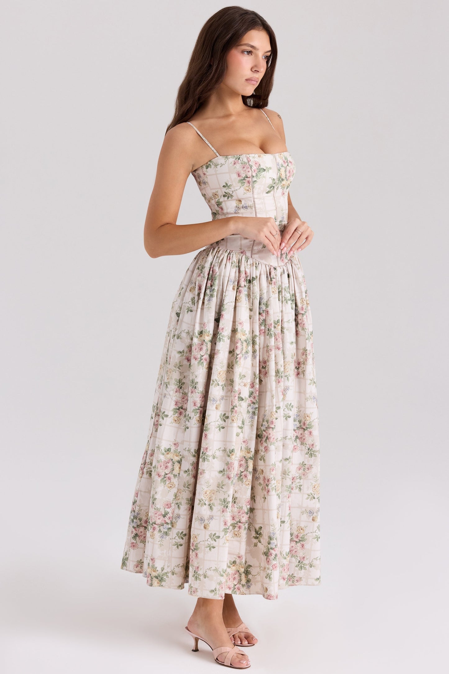 Floral midi dress with spaghetti straps and pleated skirt in cream and pink