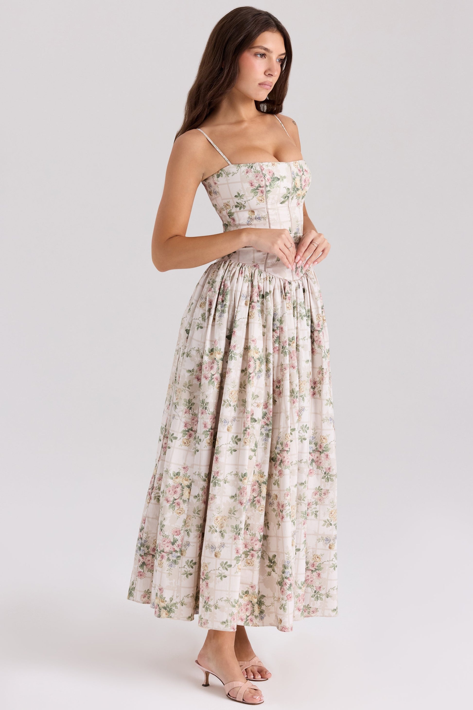 Floral midi dress with spaghetti straps and pleated skirt in cream and pink
