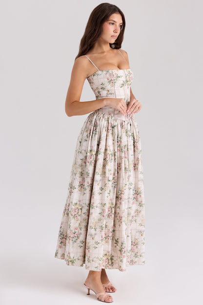 Floral midi dress with spaghetti straps and pleated skirt in cream and pink