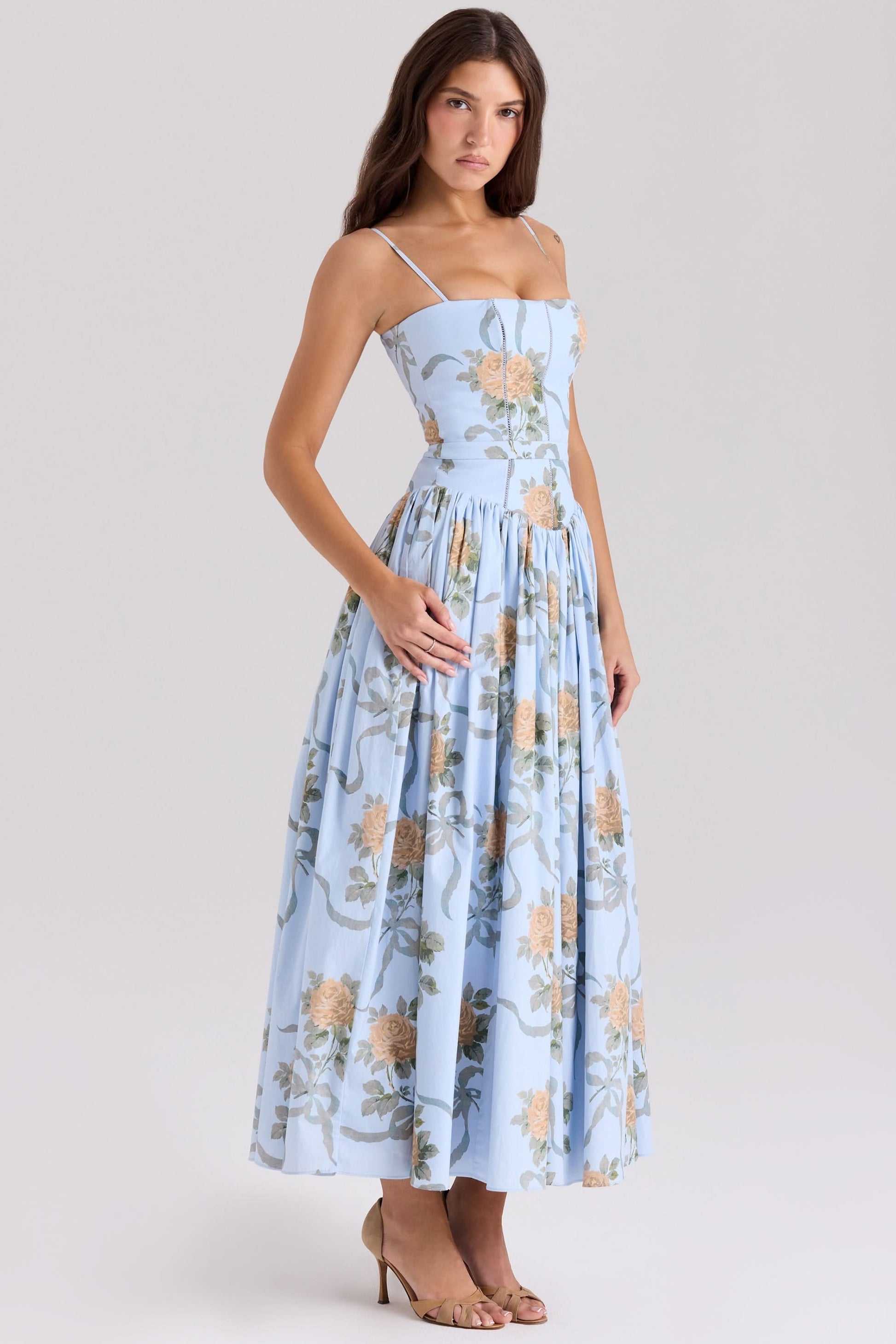 Light blue midi dress with yellow rose and leaf print, fitted bodice, full skirt