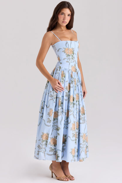 Light blue midi dress with yellow rose and leaf print, fitted bodice, full skirt