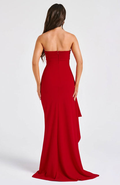 Red strapless maxi dress with asymmetrical draped hem