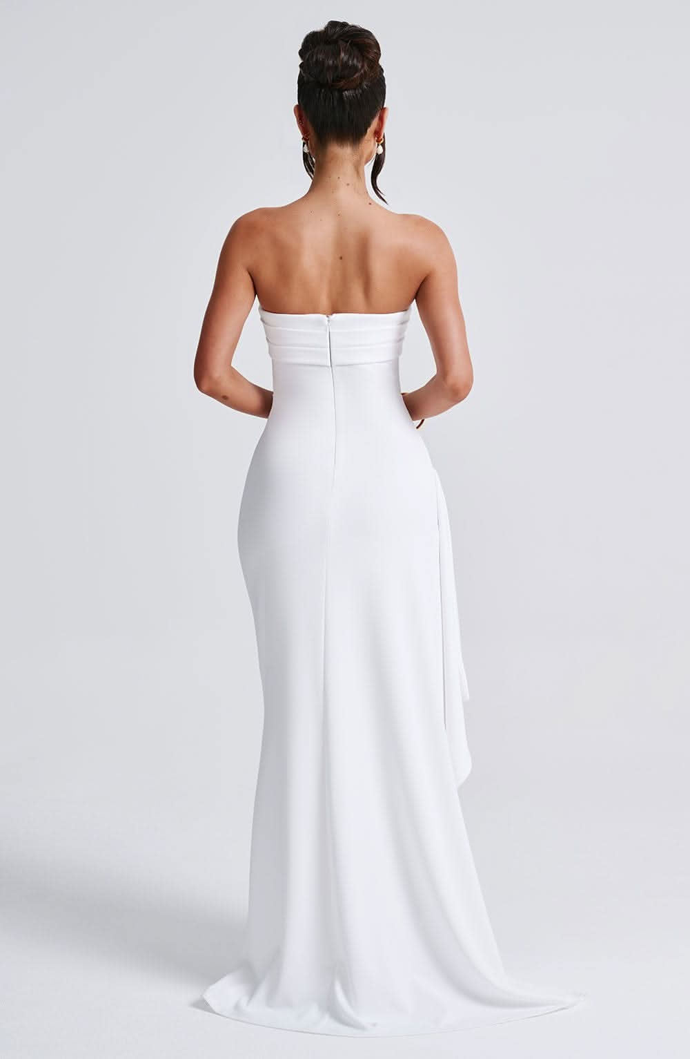 White strapless maxi dress with flowing train back view