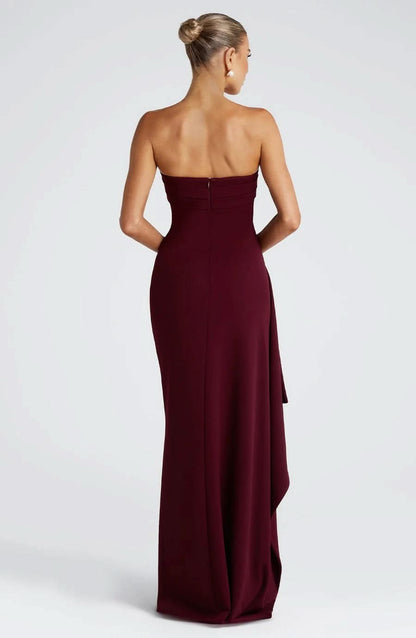 Burgundy strapless maxi dress back view with flowing train