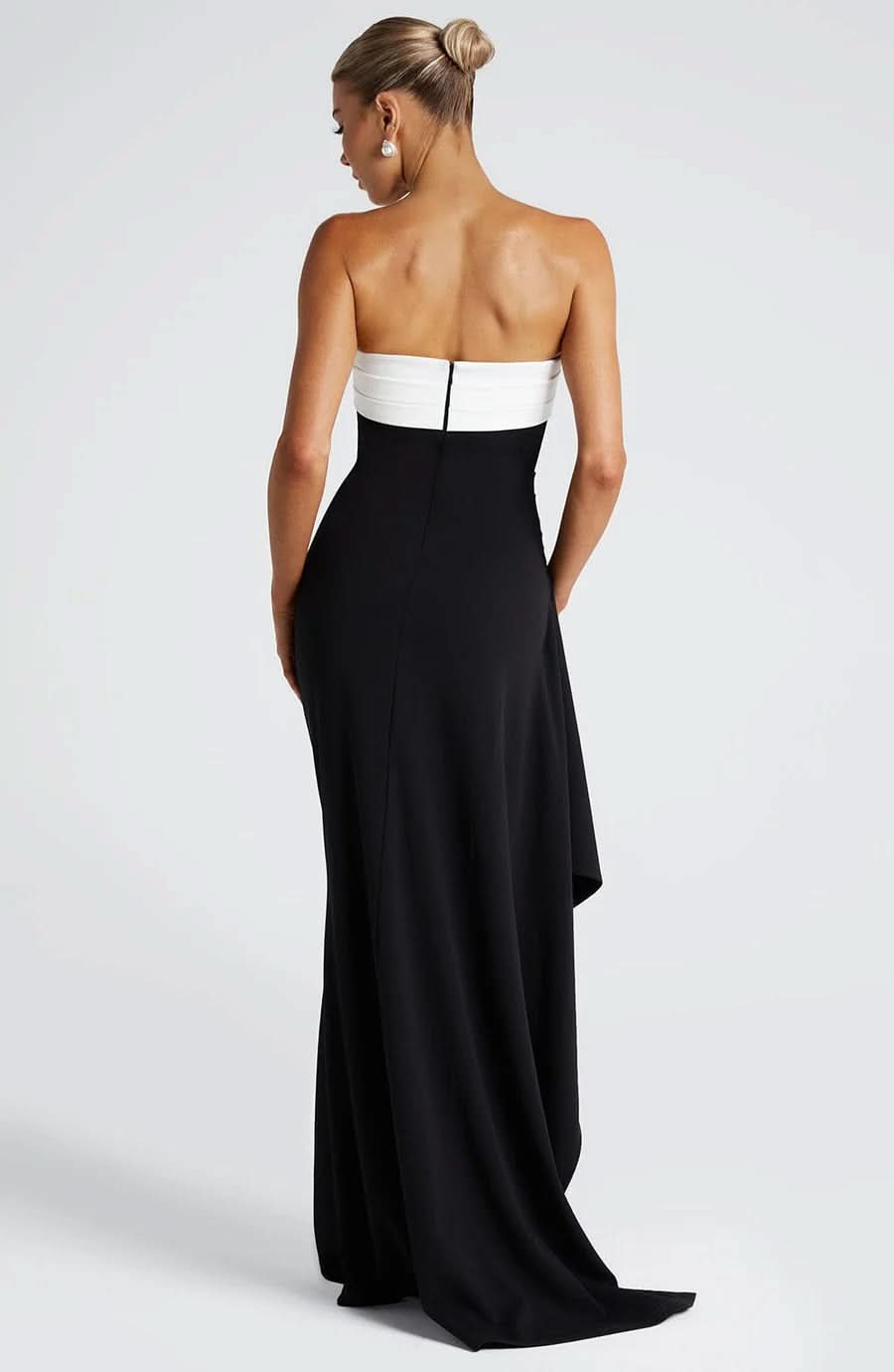 Black and white strapless maxi dress back view with train