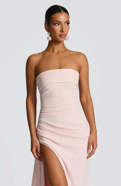 Pale pink ruched strapless maxi dress with high leg slit detail