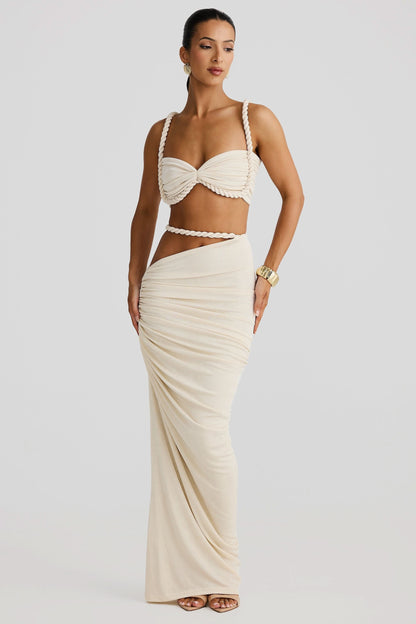 Cream two-piece maxi set with twisted bandeau top and ruched skirt